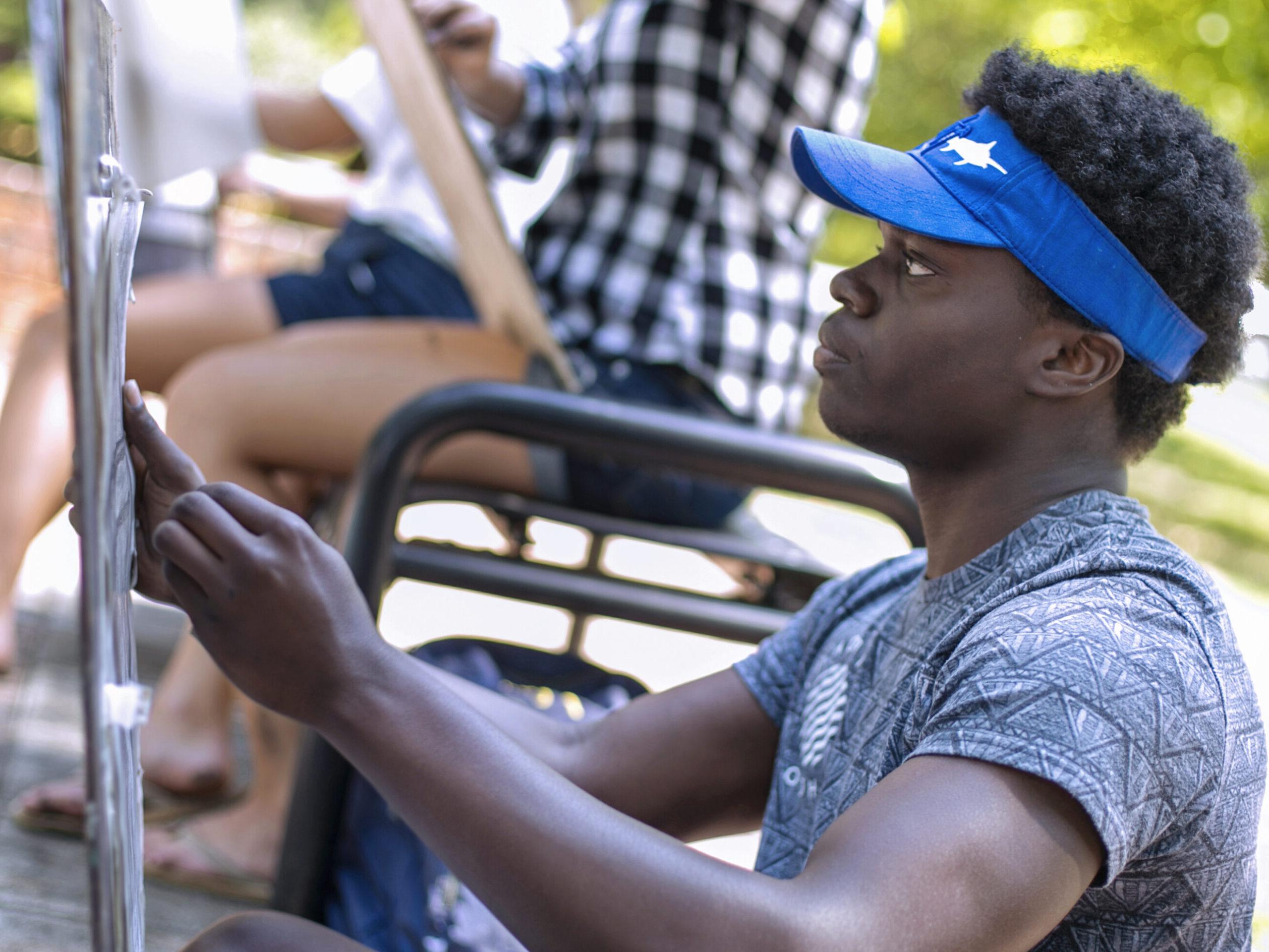 Students paint outdoors